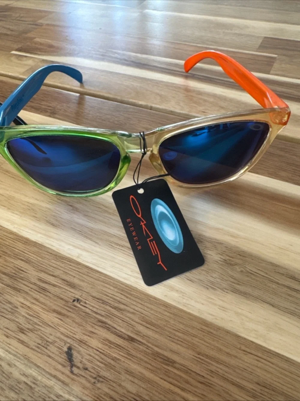 2 Oakley style kids Sunglasses polarized lenses. Not sure if authentic NWT